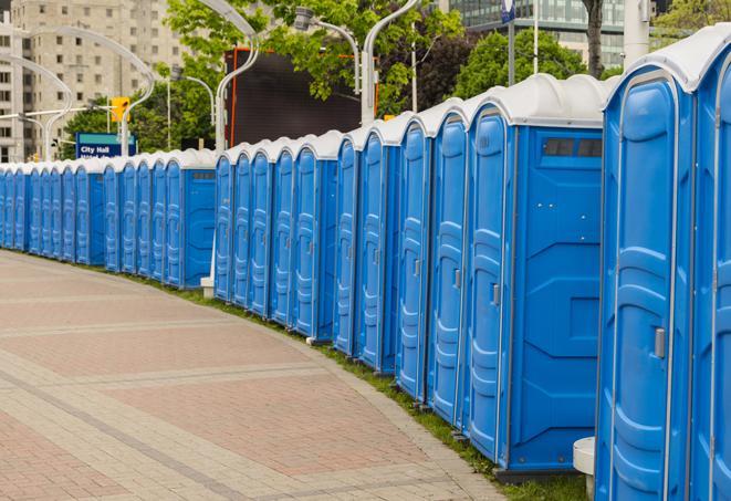 a row of sleek and modern portable restrooms at a special outdoor event in Bee Cave